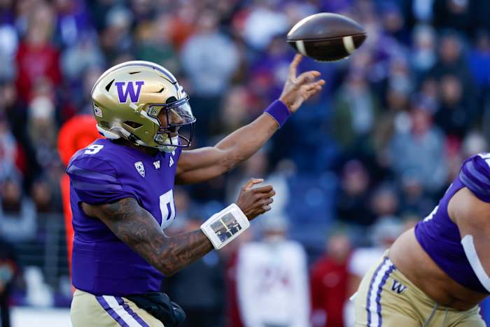 Washington Huskies quarterback Michael Penix Jr. throws a pass against the Washington State Cougars.